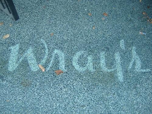 "Wray's", displayed on the ground, reflects past use as Wray's store.; Photograph by Katie Hemsworth, 2007.