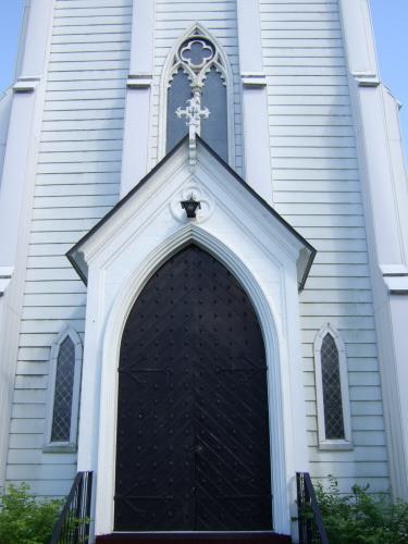 This photograph illustrates the handsome metal Gothic arch door, 2007.; Town of St. Andrews