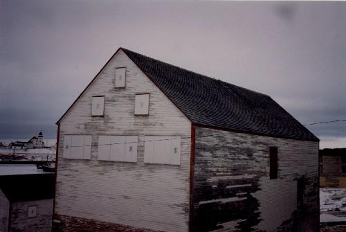 Rear view of Ryan Fish Storage, showing the simple ornamentation, 1993.; Agence Parcs Canada / Parks Canada Agency, 1993.