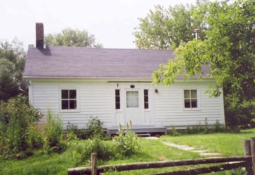Bethune –Thompson Workers' Cottage, showing symmetrical north elevation, July 2004; OHT, 2006