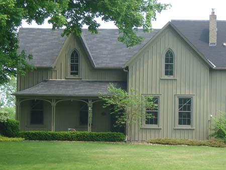 Of note are the steeply-pitched gables which feature gothic windows.; Kayla Jonas, 2007.