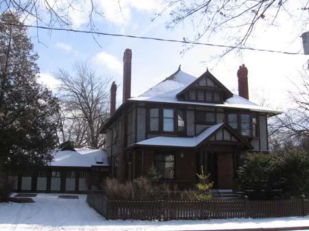West façade of 73 Heins Avenue depicting one of the entrances to the building and the garage, 2007.; Lindsay Benjamin, 2007.