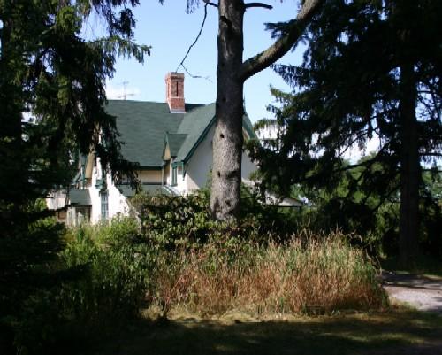 The house seen from the winding driveway; Susan Schappert, 2007